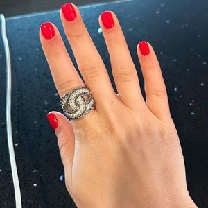 Adorable ring with gray and silver stones.